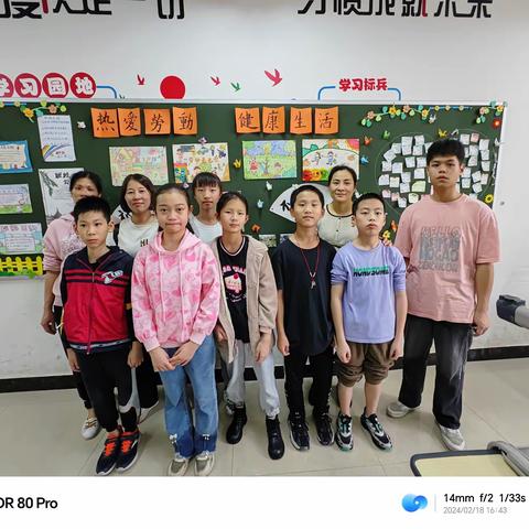 “用心护学  为爱站岗” ——记高文小学五6班家长志愿者活动