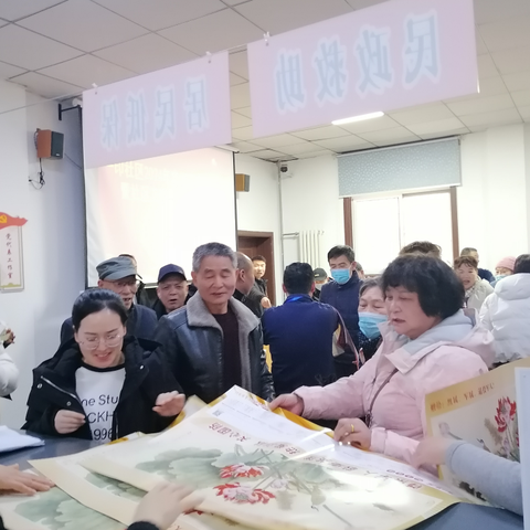 “迎新春 送祝福”一印社区年画发放活动