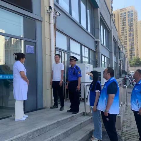 落实“门前五包”，提升社区环境