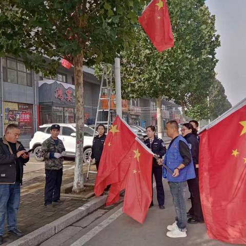 光明北路社区挂国旗喜迎国庆