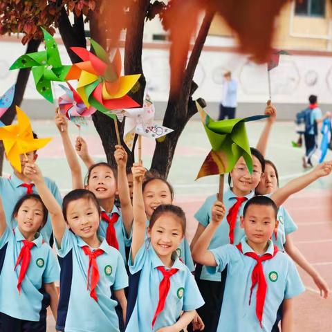 “纸”为春风来 一一东昌府区民主小学风车制作活动