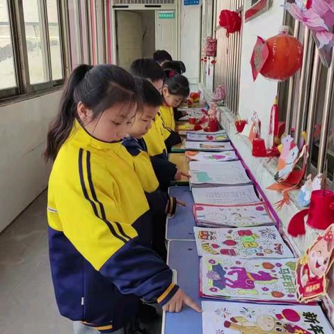 暖冬勤耕耘 作业亦生花——界河镇中心小学举办寒假“最美作业”展评活动