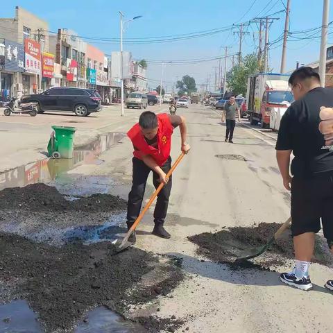 志愿服务舒民意 义务修路解民忧