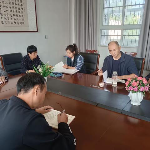 新店镇中心校第二党支部举行12月份主题党日活动