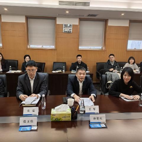 王军副行长会见新加坡分行副行长唐新庆一行