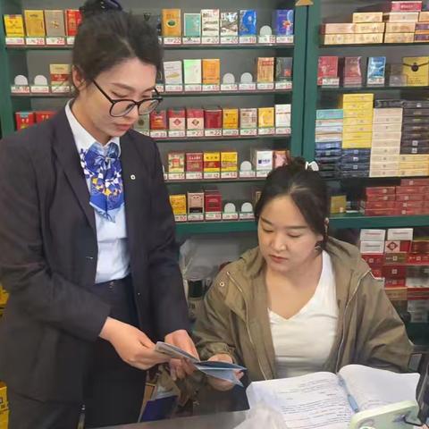 黑龙江省齐齐哈尔分行新容支行走进万达商服开展普及金融知识守住钱袋子宣传活动