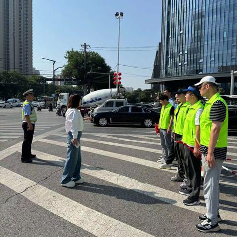 秦都区司法局组织社区矫正对象及安置帮教对象开展交通文明劝导公益活动