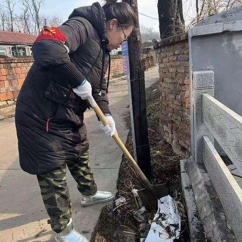 石桥子街道石桥子社区在爱国卫生月开展“清洁家园、健康相伴、共建共享”志愿服务活动