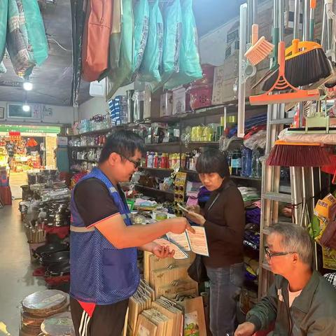 诚信潮涌自贸港羊新社区信用春风润商街