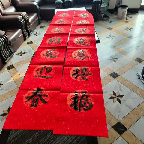 霍村社区组织开展“墨香暖邻里，红联迎新春”活动