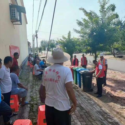 怀仁镇开展“垃圾分类投放点桶边引导”志愿者主题宣传活动