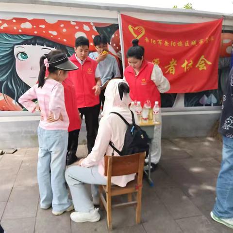 五一坚守志愿岗  文明劝导暧人心