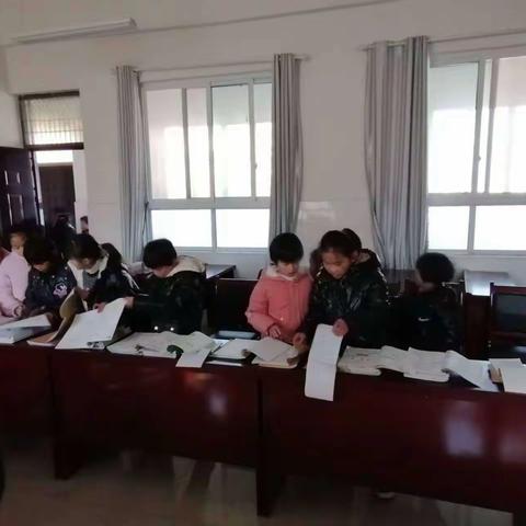 作业细检查 常规提质量——丁家中心小学开展教案、作业展评活动