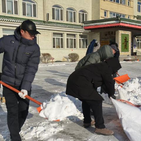 以雪为令筑安全  齐心协力暖校园一一靖宇中学师生清雪活动