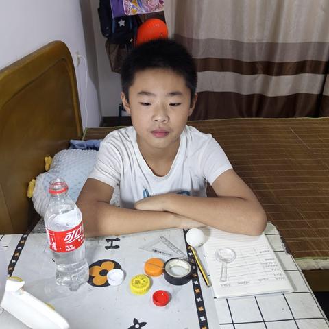 大家好，今天我要做的实验是《不会掉的乒乓球——大气压强小挑战》