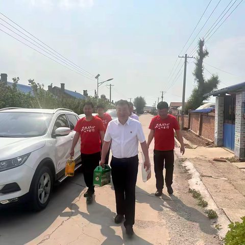 党情暖桑榆 端午送安康  —— 铁岭市第二中学党总支走访慰问西催村贫困党员活动纪实