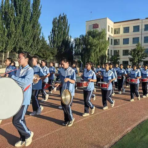 “擎旗擂鼓从今始  砥砺奋斗续辉煌”——金塔县第二中学八年级升九年级进阶仪式