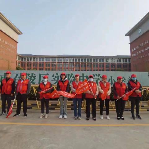 春日暖阳，温情护岗—召陵区实验中学（小学部）一（1）班护学岗