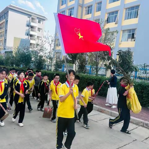 【植此新绿，共赴春光】——马塘镇十里桥移民小学植树节活动纪实