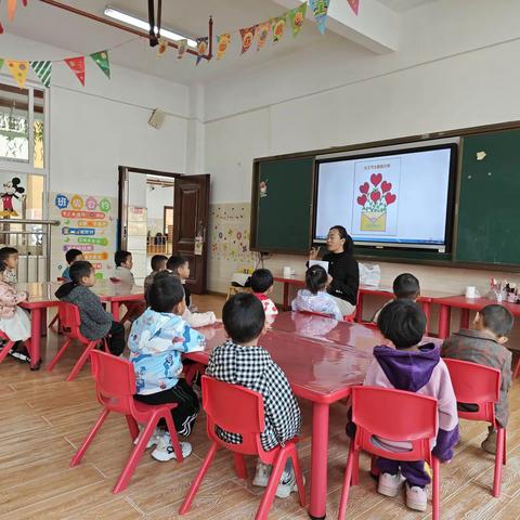 爱在春日，感恩有你。勐班乡幼儿园小一班开展三八妇女节活动。