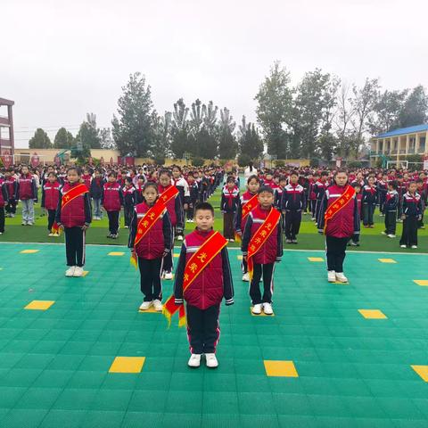 星火到少年 领巾更鲜艳——李庄镇中心小学升旗活动纪实