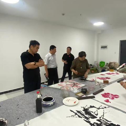 牡丹区书画研究会到西城分会指导工作