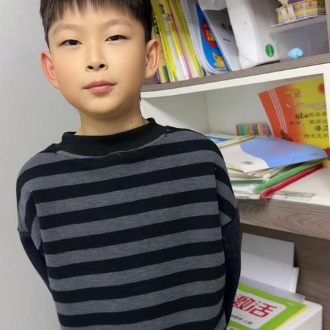 【全环境立德树人】庆云县云龙小学四年级4班“晒晒我的小书橱”活动