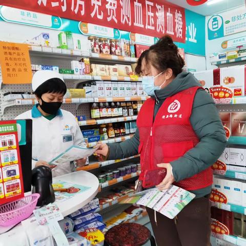 新春社区开展“分类宣传进门店 绿色环保我先干”商铺入户活动