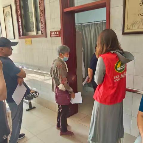济南市历城区洪家楼街道计生协组织特别家庭人员免费查体活动