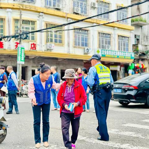 东北门社区协同定安县交警大队共同开展“关爱老幼文明出行”安全出行宣传活动