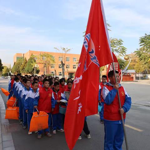 “河”你一起护绿洲•家乡盛开小兰花——吴忠市第五中学兰花志愿服务队争当志愿先锋活动纪实之三