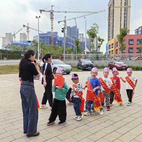 🇨🇳孺子牛托育园幼小衔接班国庆社会实践活动掠影（街头采访）