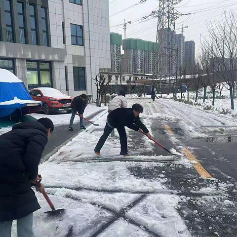 23电气一除雪活动