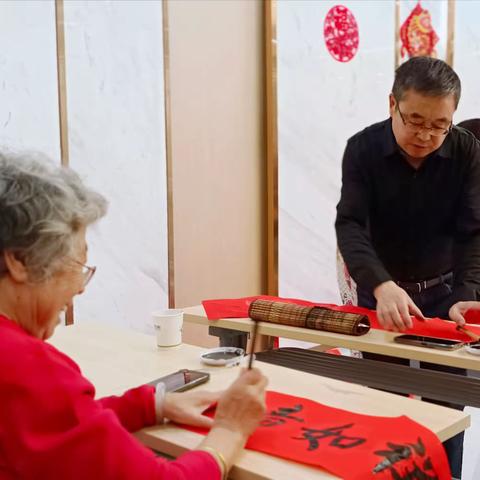 “义写春联送祝福 浓浓墨香迎新春”大庆路街道联合国药同煤口腔医院开展迎新春写对联活动