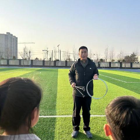 【肥乡区解放路小学】传承，让传统游戏走进体育课堂--滚铁环