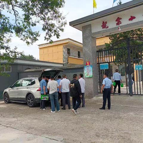 龙寨村两委携光山县斗南事务所与龙寨村小学生共同参加“童心向未来，法爱伴成长”活动