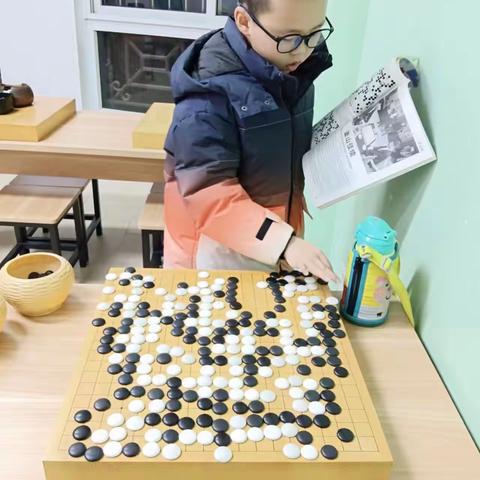 【天地自方圆，胜负黑白间】 ——杭州黑白坊围棋研学之旅                          202班  许成毅