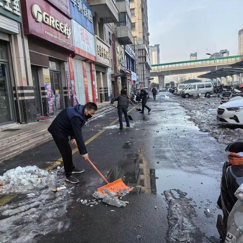 前屯社区落实“门前五包” 扫雪除冰情暖人心