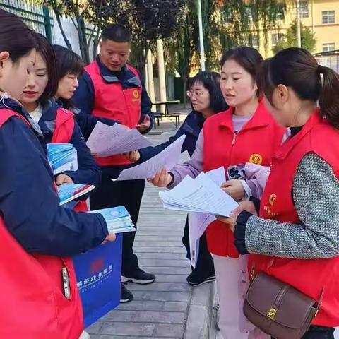 和谐社区、大家共建---麟游县九成宫镇官坪社区开展创文、“九率一度”等知识宣传“双报到”活动