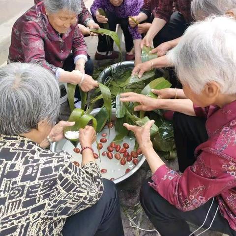 洪水社工站“甜粽龙舟扬传统，艾香端午邻里暖”--端午节系列趣味活动