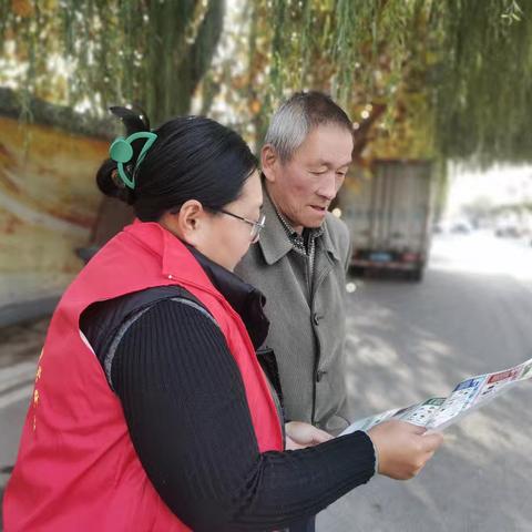 王舍人街道东沙河四村开展垃圾分类宣传活动