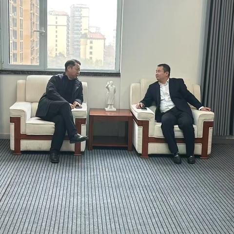 鹤壁市宝山经开区管委会主任李军华一行拜访鹤壁分行党委书记、行长王建昭