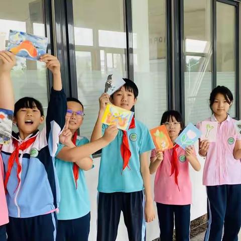 一沙一世界·一色一童年——经开一校沙画社团展示