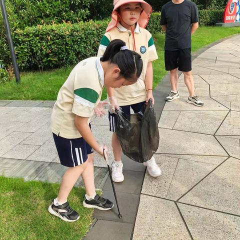 爱护环境，我们在行动 ——熟溪小学二（11）班实践活动