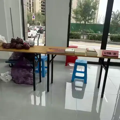 王舍人街道社区社会组织联合会联合幸福柳社区筹备组开展“以书换‘蔬’”公益活动