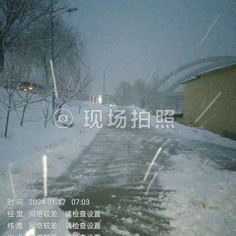 桑梓店街道丁口村开展清扫积雪活动