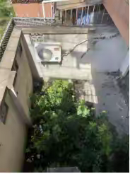 空置房内传异味 居委巧解邻里忧