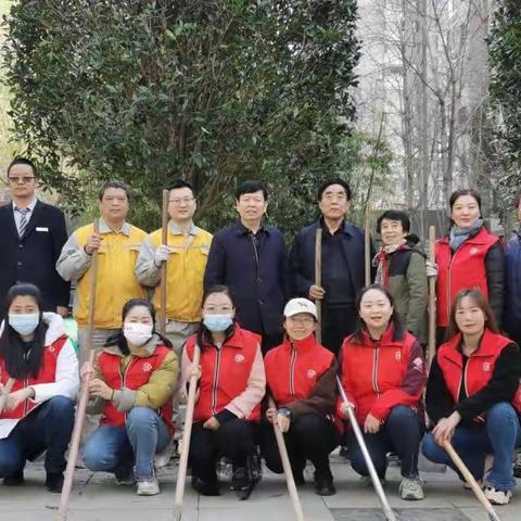 拥抱春天   播种绿色 ——谭家街道文景东区社区开展植树节活动