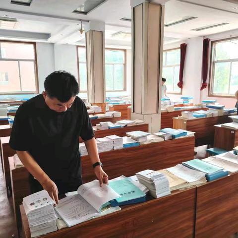 梯门镇扎实开展教师常规材料检查评估活动