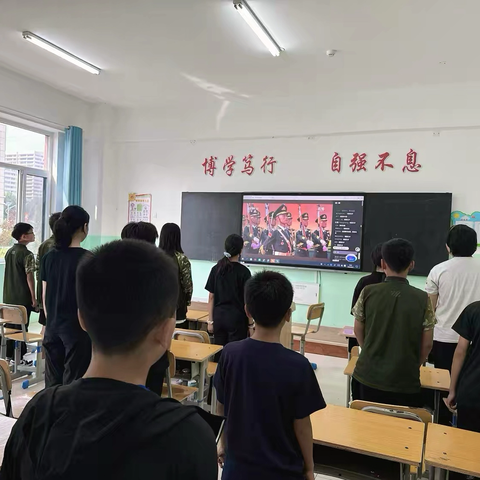 固安县体育中学七年级师生观看阅兵仪式活动简报